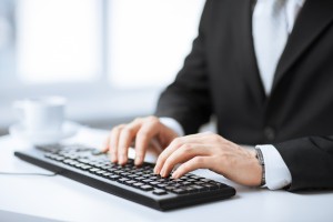man hands typing on keyboard
